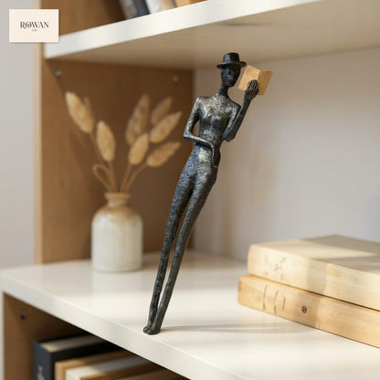 Skinny Reader Figurine with Hat