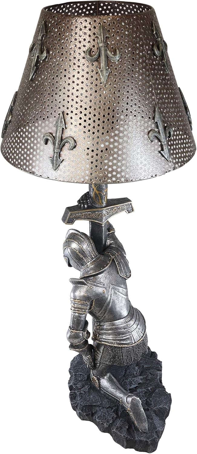 Kneeling knight lamp side view, kneeling on a craggy stone base