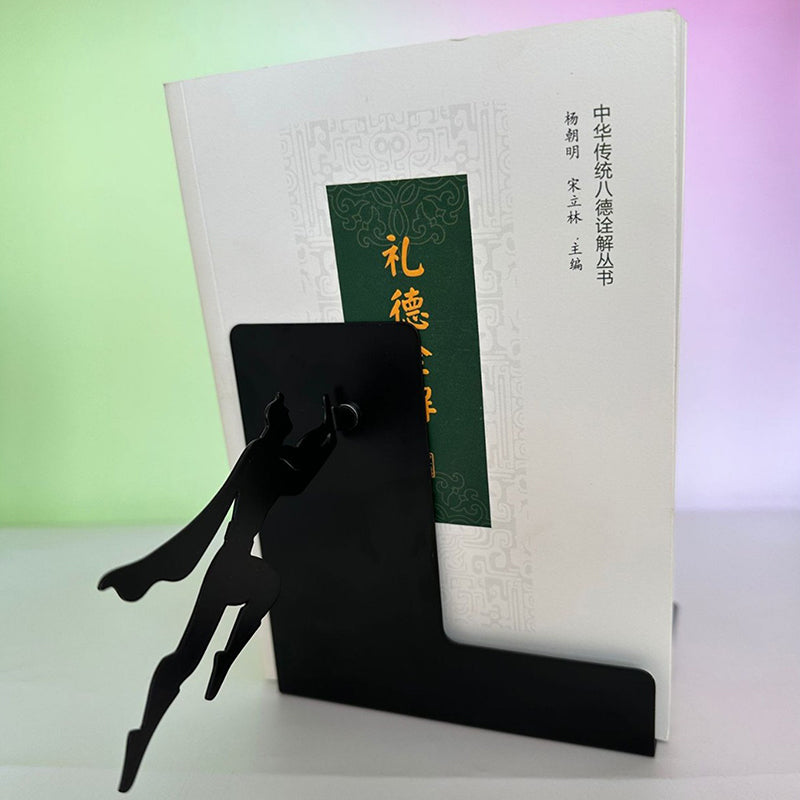 Leaning superhero floating bookshelf side view with magnetic cape hero
