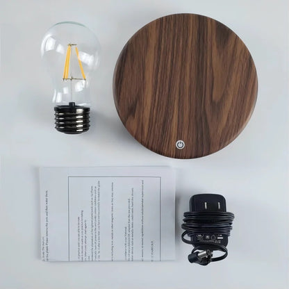 What is in the box: floating bulb, round touch base, US plug adapter and instructions