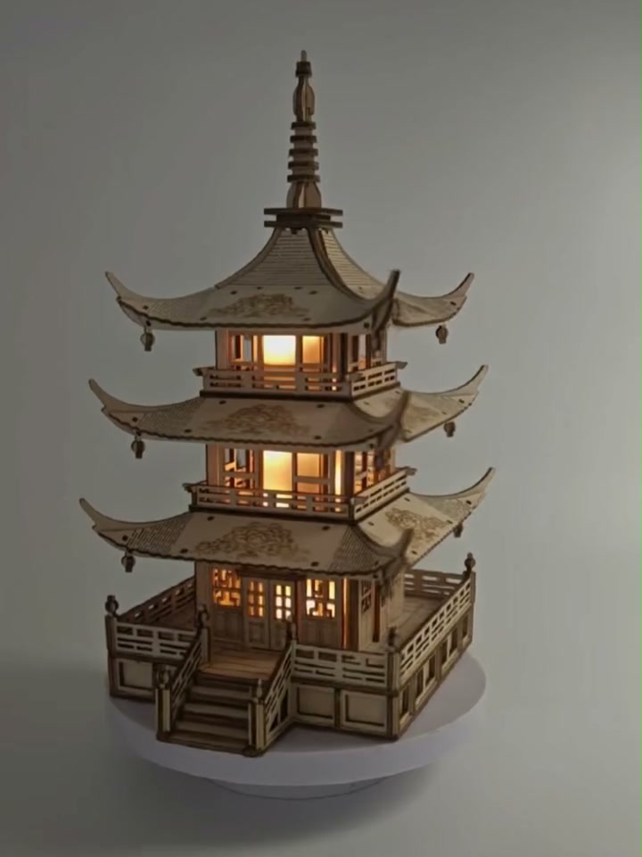 Finished wooden pagoda lamp lit up, front view