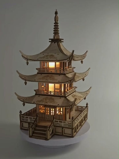 Finished wooden pagoda lamp lit up, front view